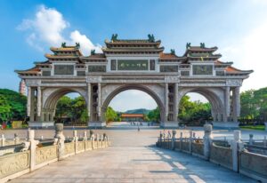 The grand archway of Shunfengshan Park, an iconic landmark in Shunde, Guangdong, China.