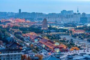 Aerial view of the Giant Wild Goose Pagoda and traditional architecture in Xi'an, Shaanxi, China at dusk