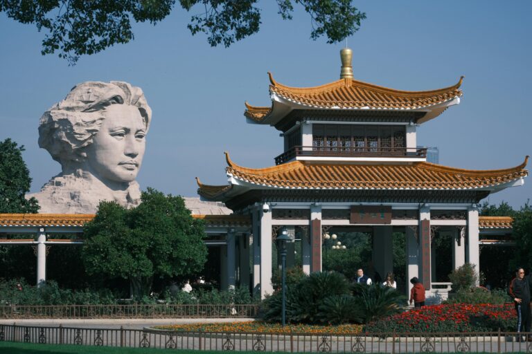 Giant Mao Zedong Youth Art Statue at Orange Isle Head, Changsha, Hunan, China, overlooking the Xiangjiang River.